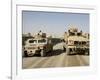 The Mine Resistant Ambush Protected All Terrain Vehicle and its Predecessor, the Humvee-null-Framed Photographic Print