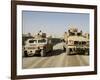 The Mine Resistant Ambush Protected All Terrain Vehicle and its Predecessor, the Humvee-null-Framed Photographic Print