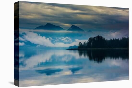 The misty mountains and calm waters of the Tongass National Forest, Southeast Alaska, USA-Mark A Johnson-Stretched Canvas