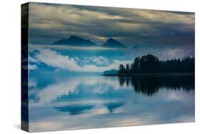 The misty mountains and calm waters of the Tongass National Forest, Southeast Alaska, USA-Mark A Johnson-Stretched Canvas