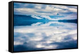 The misty mountains and calm waters of the Tongass National Forest, Southeast Alaska, USA-Mark A Johnson-Framed Stretched Canvas