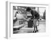 The Modern Female Petrol Pump Operator Refuelling a Car in Her Mini Skirt-null-Framed Premium Photographic Print