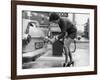 The Modern Female Petrol Pump Operator Refuelling a Car in Her Mini Skirt-null-Framed Photographic Print