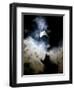 The Moon Partially Covers the Sun Behind the Clouds During a Partial Solar Eclipse-null-Framed Photographic Print