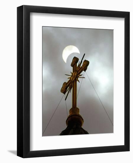 The Moon Partially Covers the Sun During a Partial Solar Eclipse-null-Framed Premium Photographic Print