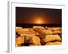 The Moon Rising Behind Rocks Lit by a Nearby Fire in Miramar, Argentina-Stocktrek Images-Framed Photographic Print