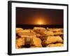 The Moon Rising Behind Rocks Lit by a Nearby Fire in Miramar, Argentina-Stocktrek Images-Framed Photographic Print