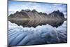 The mountains reflect on the surface of the ocean. Stokksnes, Eastern Iceland, Europe-ClickAlps-Mounted Photographic Print