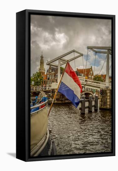 The Netherlands, Haarlem, Canal, Flag-Ingo Boelter-Framed Stretched Canvas