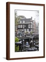 The Netherlands, Holland, Amsterdam, bicycle in canal-olbor-Framed Photographic Print
