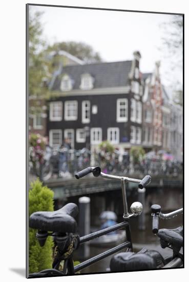 The Netherlands, Holland, Amsterdam, bicycle in canal-olbor-Mounted Photographic Print