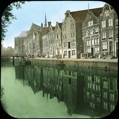 https://imgc.allpostersimages.com/img/posters/the-nieuwe-zijds-voorburgwal-canal-amsterdam-netherlands-1883_u-L-Q1J613Y0.jpg?artPerspective=n