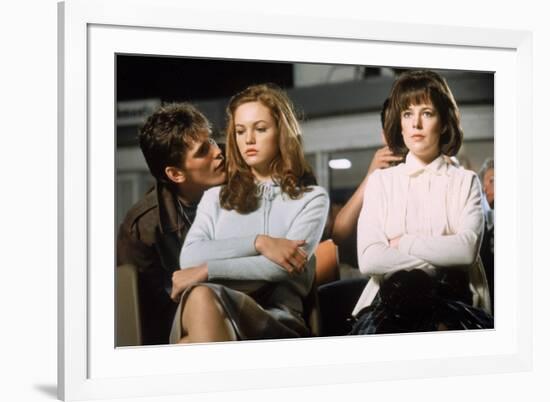 THE OUTSIDERS, 1982 directed by FRANCIS FORD COPPOLA Matt Dillon, Diane Lane and Michelle Meyrink (-null-Framed Photo