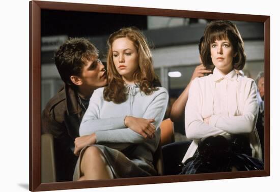 THE OUTSIDERS, 1982 directed by FRANCIS FORD COPPOLA Matt Dillon, Diane Lane and Michelle Meyrink (-null-Framed Photo