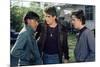 THE OUTSIDERS, 1982 directed by FRANCIS FORD COPPOLA Ralph Macchio, Matt Dillon andThomas C. Howell-null-Mounted Photo