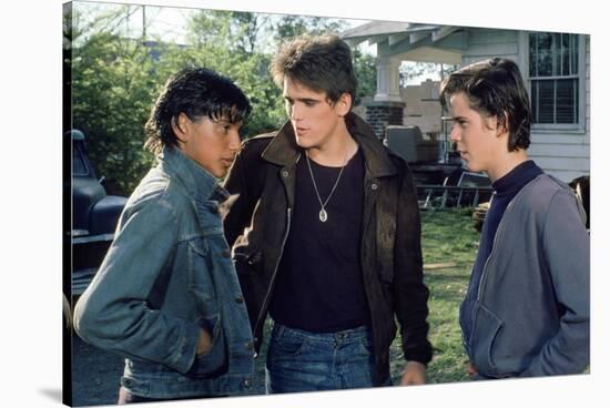 THE OUTSIDERS, 1982 directed by FRANCIS FORD COPPOLA Ralph Macchio, Matt Dillon andThomas C. Howell-null-Stretched Canvas