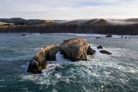 'The Pacific Ocean washes against a sea stack off the northern ...