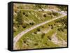 The Pack Rides Down the Glandon Pass During the 17th Stage of the Tour De France-null-Framed Stretched Canvas