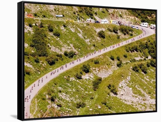 The Pack Rides Down the Glandon Pass During the 17th Stage of the Tour De France-null-Framed Stretched Canvas