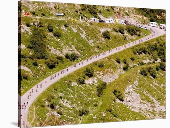 The Pack Rides Down the Glandon Pass During the 17th Stage of the Tour De France-null-Stretched Canvas