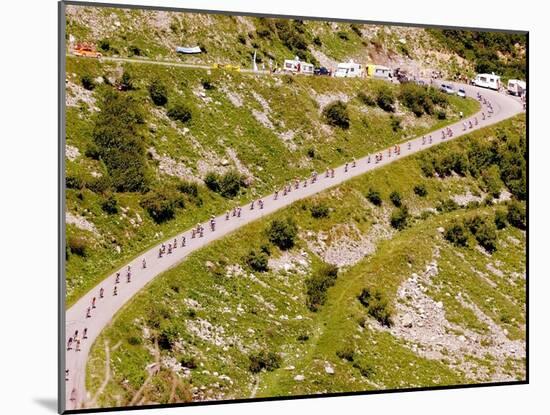 The Pack Rides Down the Glandon Pass During the 17th Stage of the Tour De France-null-Mounted Premium Photographic Print