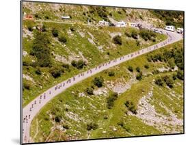 The Pack Rides Down the Glandon Pass During the 17th Stage of the Tour De France-null-Mounted Premium Photographic Print