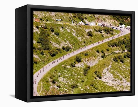 The Pack Rides Down the Glandon Pass During the 17th Stage of the Tour De France-null-Framed Stretched Canvas