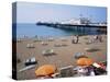 The Palace Pier and Beach, Brighton, Sussex, England, United Kingdom-Roy Rainford-Stretched Canvas