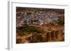 The Palace Walls of Mehrangarh Fort Towering over the Blue Rooftops in Jodhpur, the Blue City-Laura Grier-Framed Photographic Print