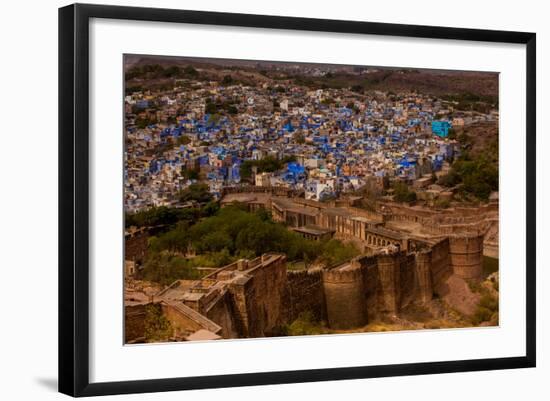 The Palace Walls of Mehrangarh Fort Towering over the Blue Rooftops in Jodhpur, the Blue City-Laura Grier-Framed Photographic Print