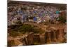 The Palace Walls of Mehrangarh Fort Towering over the Blue Rooftops in Jodhpur, the Blue City-Laura Grier-Mounted Photographic Print