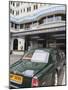 The Peninsula Hotel and One of the Hotel's Fleet of Green Rolls Royces, Hong Kong, China, Asia-Amanda Hall-Mounted Photographic Print