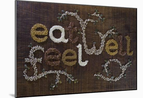 The Phrase 'Eat Well, Be Well', Written And Decorated In Seeds-The Full 360-Mounted Poster