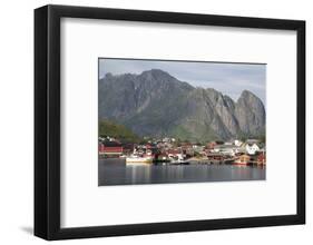 The picturesque fishing village of Reine surrounded by mountains on Moskenesoya-Ellen Rooney-Framed Photographic Print