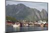 The picturesque fishing village of Reine surrounded by mountains on Moskenesoya-Ellen Rooney-Mounted Photographic Print