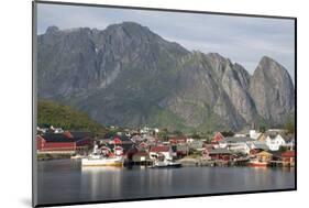 The picturesque fishing village of Reine surrounded by mountains on Moskenesoya-Ellen Rooney-Mounted Photographic Print