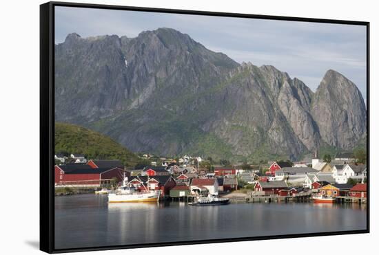 The picturesque fishing village of Reine surrounded by mountains on Moskenesoya-Ellen Rooney-Framed Stretched Canvas