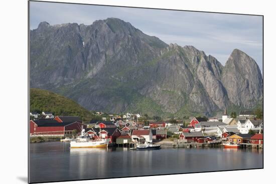 The picturesque fishing village of Reine surrounded by mountains on Moskenesoya-Ellen Rooney-Mounted Photographic Print