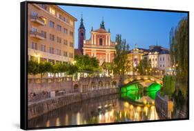 The pink Franciscan Church of the Annunciation, Ljubljanica River and the Triple Bridge, Slovenia-Neale Clark-Framed Stretched Canvas