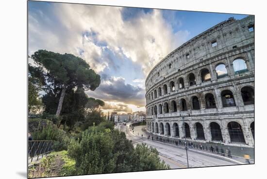 The pink sky at sunrise frames the ancient Colosseum (Flavian Amphitheatre), UNESCO World Heritage -Roberto Moiola-Mounted Premium Photographic Print