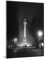 The Place De La Bastille Shimmering with Light During the Night-Ralph Morse-Mounted Photographic Print