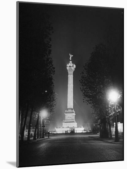 The Place De La Bastille Shimmering with Light During the Night-Ralph Morse-Mounted Photographic Print