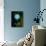 The Planet Pluto-Michael Tompsett-Mounted Art Print displayed on a wall