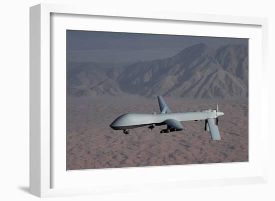 The Predator Drone Carrying Hellfire Missiles in Flight, Dec. 16, 2008-null-Framed Photo