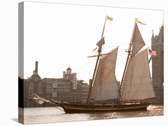 The Pride of Baltimore II Arrives off the Pool of London Next to Tower Bridge-null-Stretched Canvas