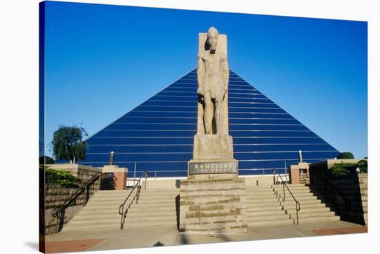 The Pyramid Sports Arena in Memphis, TN with statue of Ramses at entrance-null-Stretched Canvas