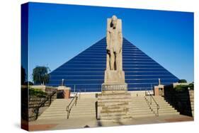 The Pyramid Sports Arena in Memphis, TN with statue of Ramses at entrance-null-Stretched Canvas