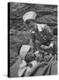 The Red Cross Nurse Trying to Help the Injured Man Eat and Drink-Allan Grant-Stretched Canvas