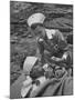 The Red Cross Nurse Trying to Help the Injured Man Eat and Drink-Allan Grant-Mounted Photographic Print