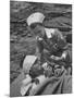 The Red Cross Nurse Trying to Help the Injured Man Eat and Drink-Allan Grant-Mounted Photographic Print